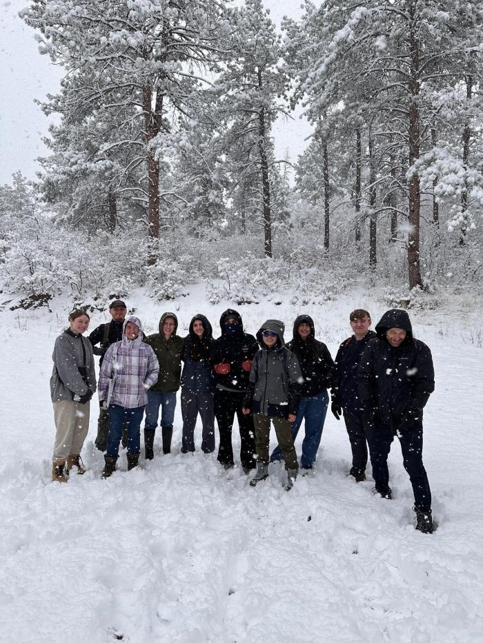 The ACC Microbiology Honors Research Team posing for a picture in the snow on field day.