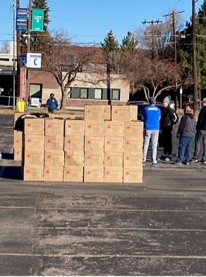 stack of boxes for donation to the Littleton community