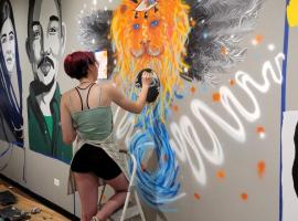 ACC students creating murals in Colorado Gallery of the Arts