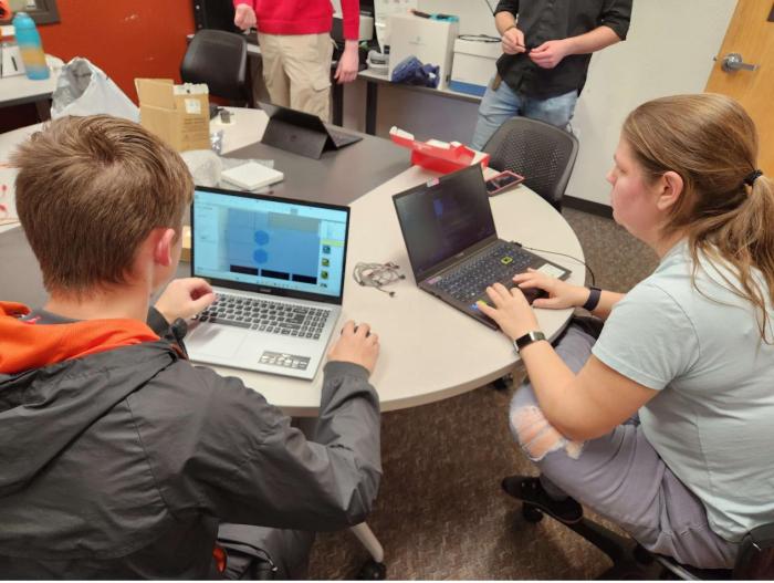 ACC and RRCC students working on laptops during the design phase