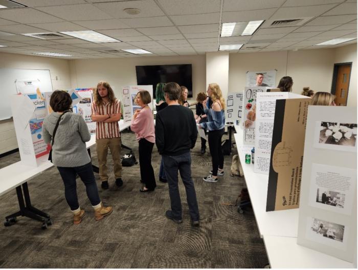 ACC students and staff at Service Learning Poster Session on May 2 at ACC's Littleton Campus.