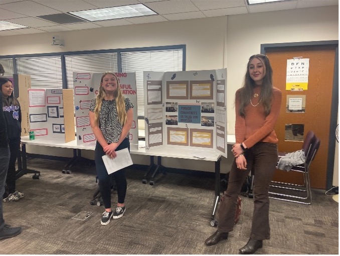 Students and staff at the Service Learning Poster Session at ACC's Littleton Campus. 