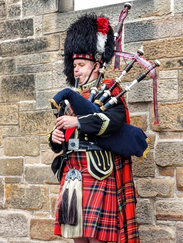 Bagpiper playing bagpipes