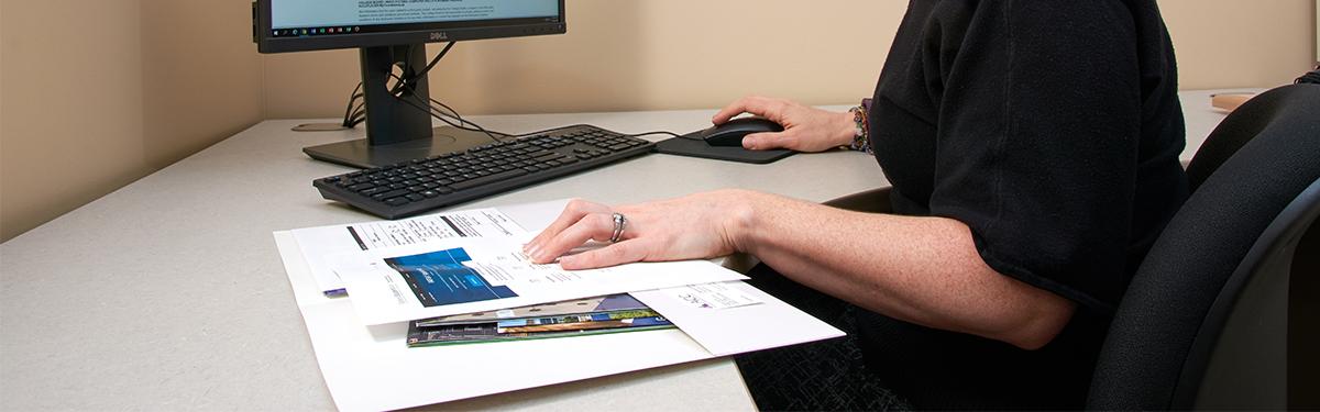 An ACC student researching careers at a computer at the Littleton Campus.