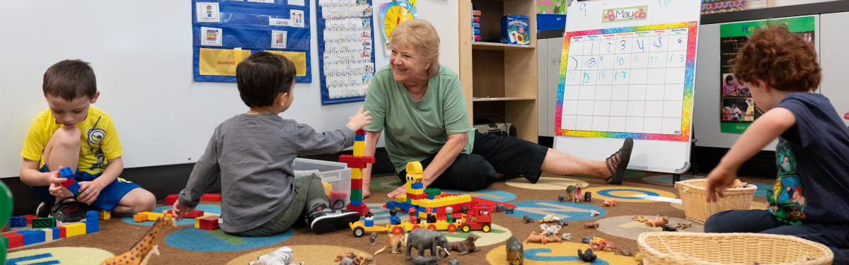 Students and teacher in preschool class at ACC's Child Development Center at the Littleton Campus.