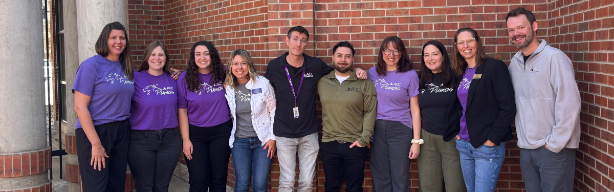 ACC Concurrent Enrollment staff pose outside of the Art & Design Center at ACC's Littleton Campus.