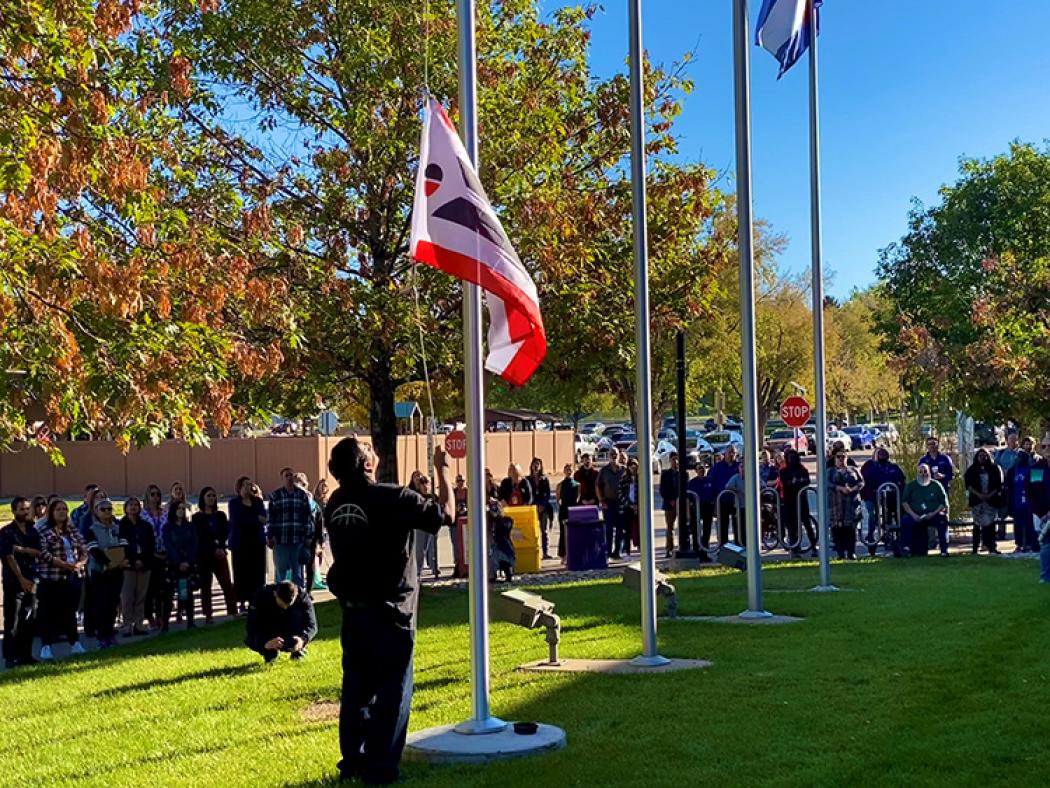 Northern Arapaho Day 2023 - Flag raising ceremony at ACC's Littleton Campus in front of the main building.