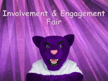 Summit, ACC's Puma mascot in front of purple curtain - Involvement & Engagement Fair