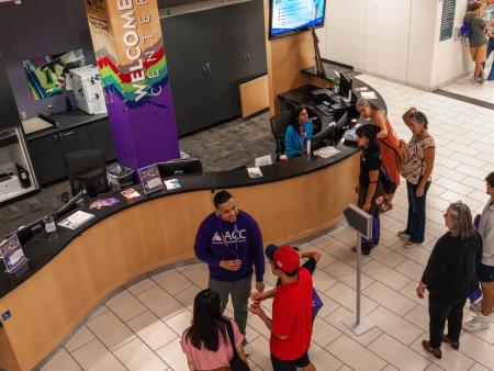 Students getting help at the Welcome Center at Littleton Campus