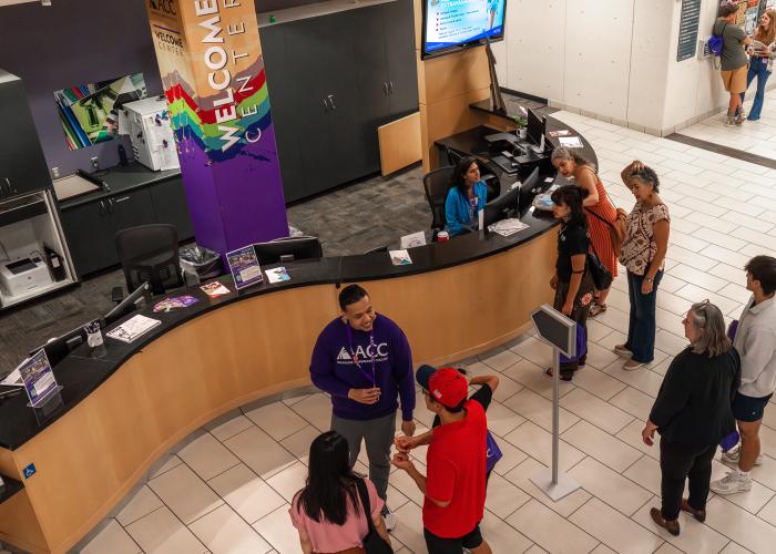 Students getting help at the Welcome Center at Littleton Campus