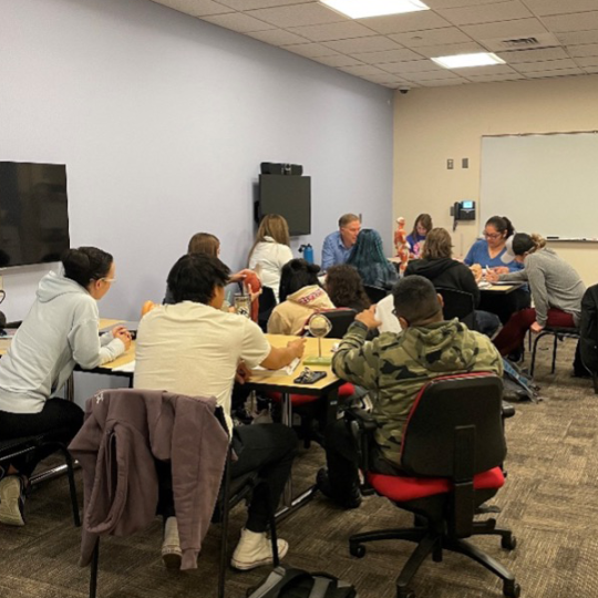 ACC students sitting in a classroom in the annex at the Littleton Campus.